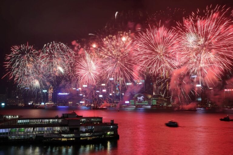A sombre and devastating scene of a fireworks shop explosion during Lunar New Year celebrations, with emergency services and bystanders surveying the damage and destruction, highlighting the importance of safety precautions during festivities, with colourful fireworks and decorations in the background, now a reminder of the tragic loss of life