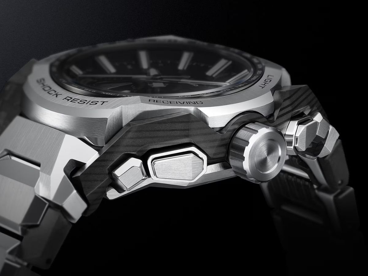 The Casio G-Shock MTG-B4000 watch features a unique hybrid carbon and stainless steel casing, with a sleek and modern design, perfect for outdoor enthusiasts, with a focus on the G-Shock MTG-B4000 model