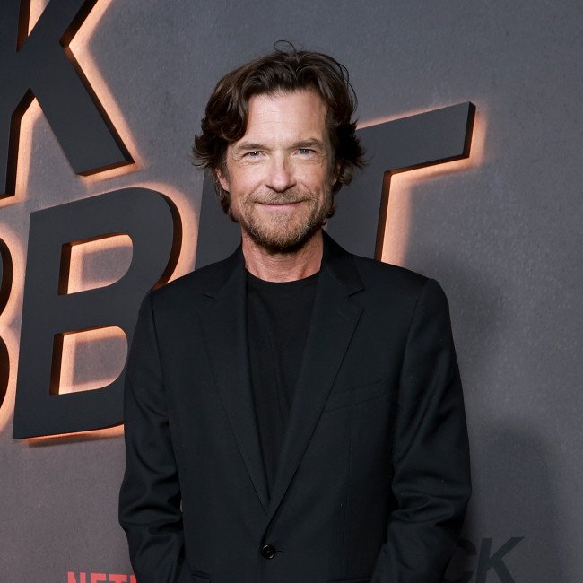 A photo of a celebrity on the red carpet, with a caption that reads 'from struggling to stardom', highlighting the journey of celebrities who almost quit before making it big in the entertainment industry, with a focus on perseverance and determination