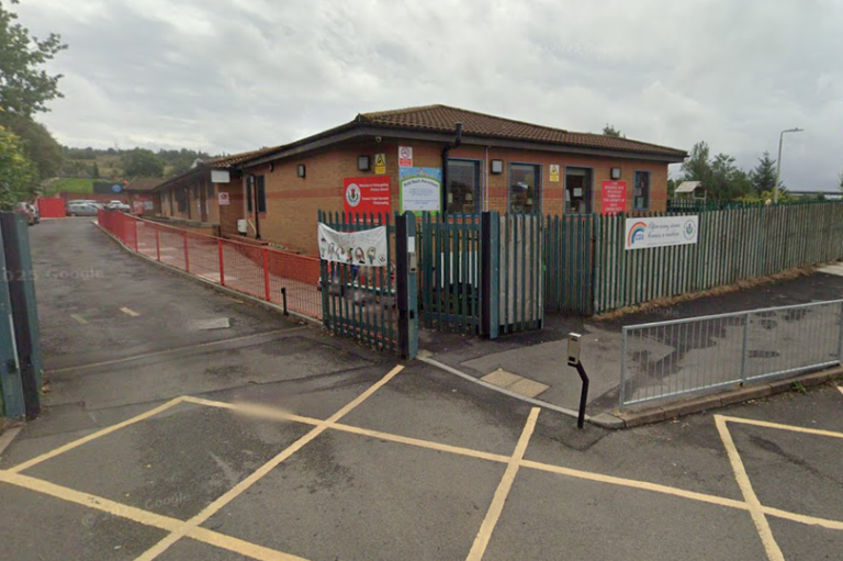 A school building with a sign indicating closure due to a suspected gas leak, highlighting the importance of gas safety in public buildings