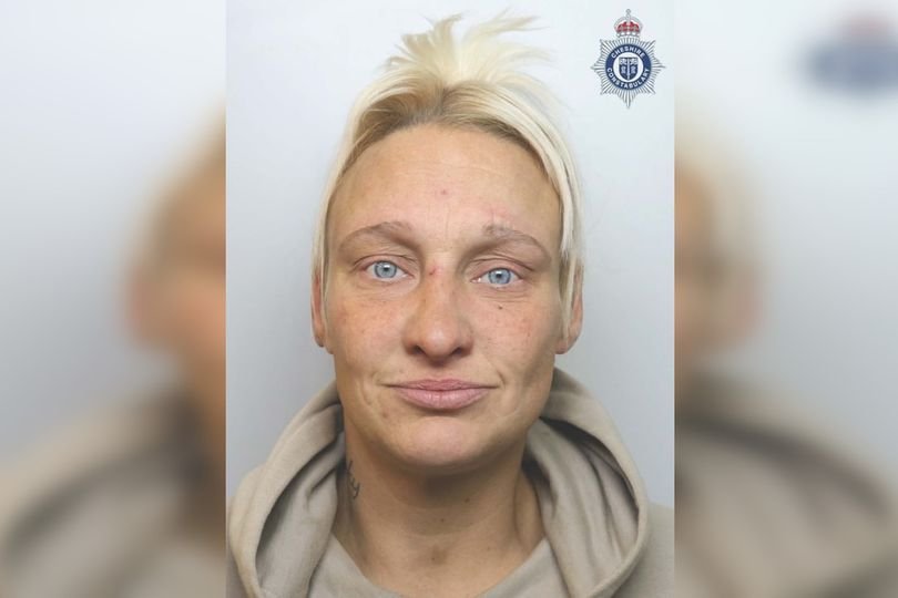 A woman being escorted away by authorities due to antisocial behaviour, with a blurred background of a local community, highlighting the impact of such behaviour on community safety and social cohesion