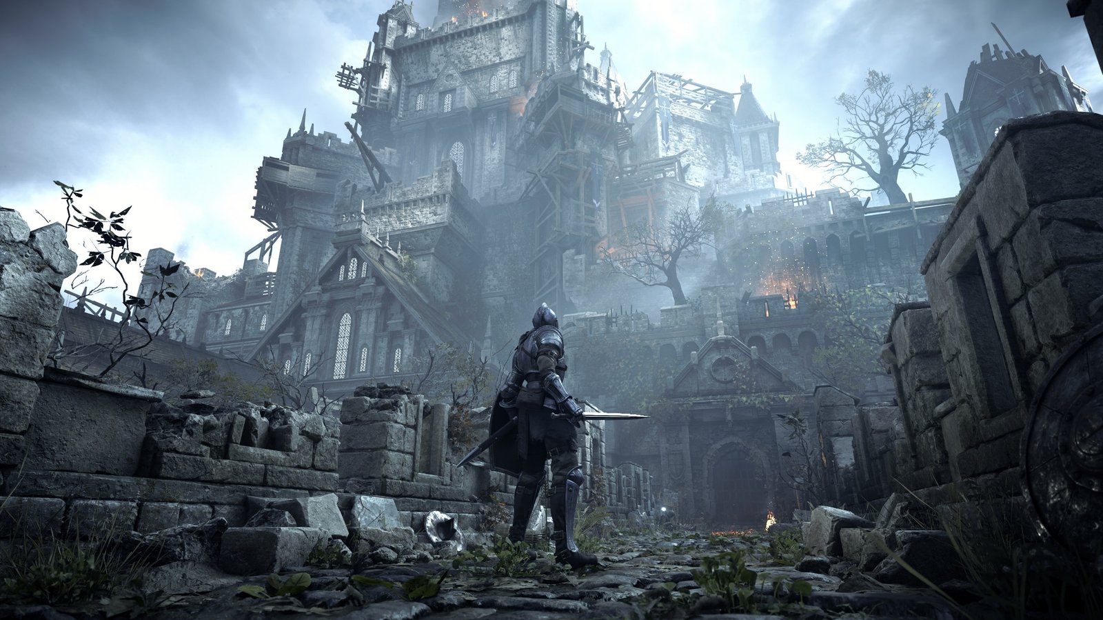 A screenshot of the Demon's Souls Remake, showcasing the dark fantasy world and intense gameplay, developed by Bluepoint Games, a studio known for their work on iconic franchises, now facing closure by PlayStation