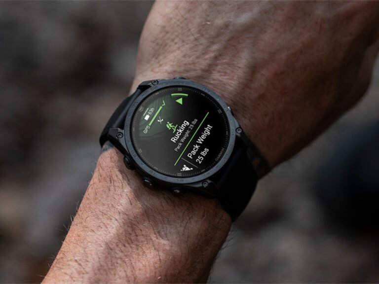 Garmin smartwatch with new update features, including fitness tracking and colour displays, on a runner's wrist