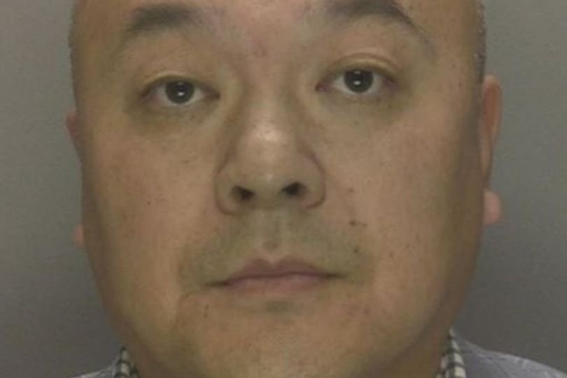 A judge's gavel on a desk, with a blurred background of a courtroom, the primary keyword is brothel owner, the image represents the severity of the situation and the importance of upholding the law, the colour of the gavel is black, and the wood is brown, the image is a symbol of justice and the consequences of breaking the law