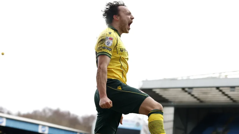 Wrexham player Ollie Rathbone scores volley