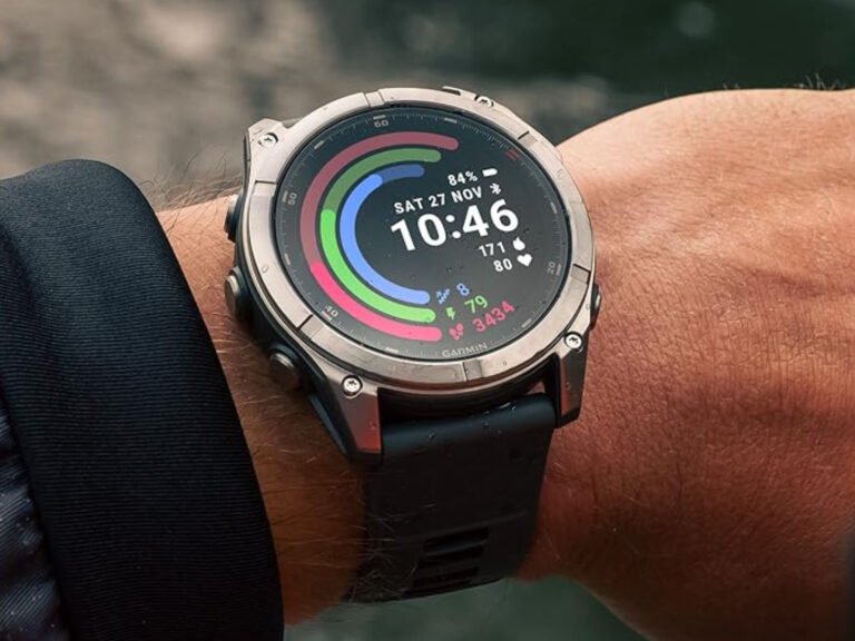 A Garmin smartwatch on a person's wrist, displaying sleep mode data, with a cityscape in the background, highlighting the intersection of technology and health, as the primary keyword, Garmin smartwatch, is naturally included