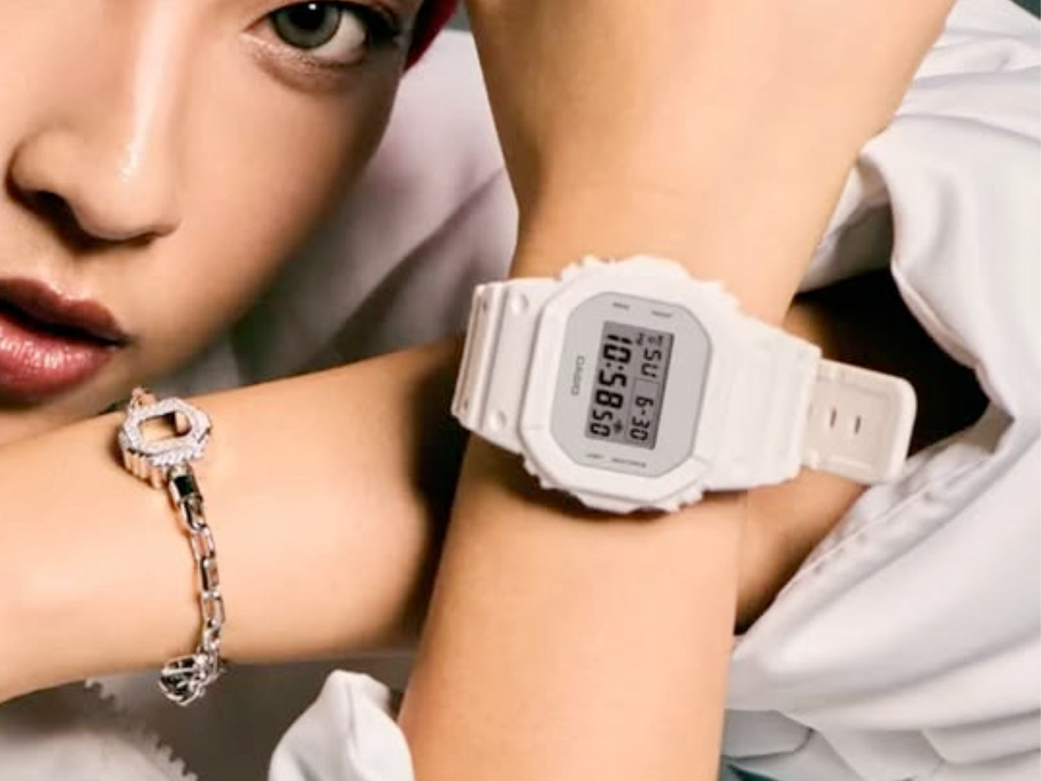 Featured image of the Casio G-Shock DW-5600WW-7PR limited-edition collaboration watch, showcasing its distinctive packaging and bold colour scheme, with Japanese dancer Kyoka in the background, highlighting the special edition's unique design and style