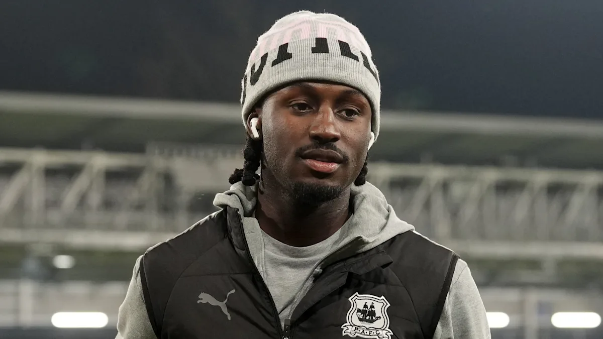 Stevenage and Plymouth football teams in action