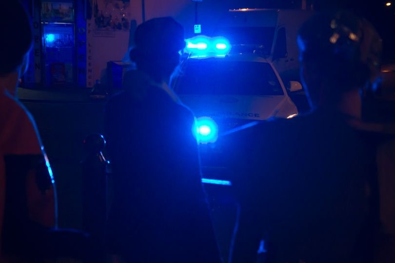 A sombre and respectful image of a police car outside a family home, with a focus on the tragedy of a family of four found dead in a horror discovery, highlighting the importance of community support and mental health awareness