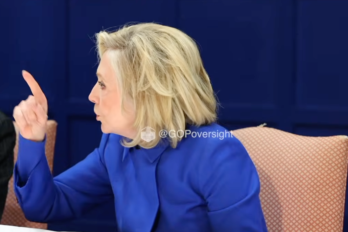 Hillary Clinton leaving the Epstein hearing with a mixture of shock and anger on her face, highlighting the primary keyword phrase 'Epstein hearing' and the controversy surrounding it