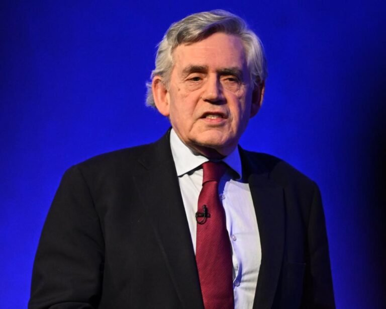 Gordon Brown studying the Epstein files with a magnifying glass, symbolising his thorough investigation into the truth, with a hint of mystery and intrigue, as he delves deeper into the complex web of secrets and scandals, with the UK flag in the background, representing his commitment to uncovering the truth for the nation