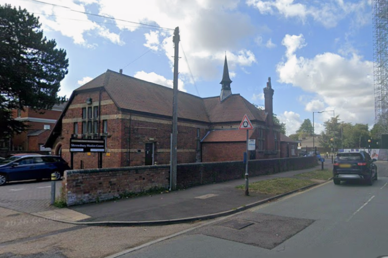 A photo of a Muslim centre with a mix of people from different backgrounds and faiths, promoting a sense of community and respect, with a focus on Racially Aggravated Assault