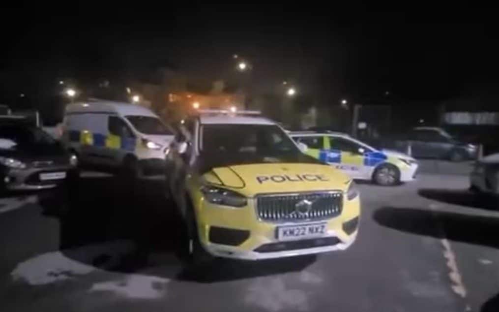 A mosque during Ramadan prayers, with a sense of community and tranquillity, disrupted by the sudden appearance of armed men, highlighting the need for increased security measures and community safety