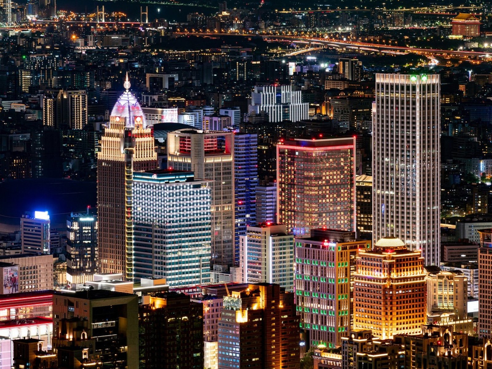 A graphic illustration of the global economy, with a focus on the China-Taiwan region, highlighting the potential economic risk and crisis tied to the escalating tensions between the two nations, with a subtle background image of a stock market screen displaying volatile market behaviour