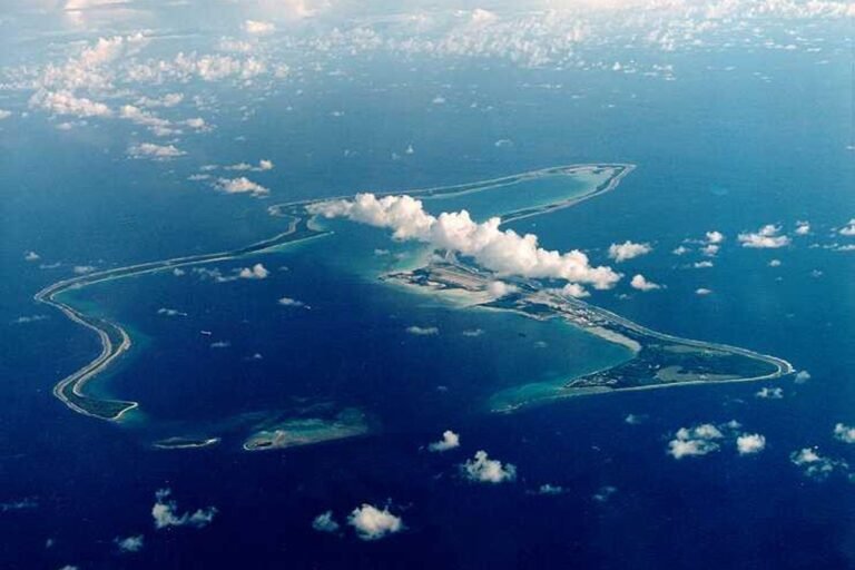 Aerial view of the Chagos Islands, a remote archipelago in the Indian Ocean, with a US military base and a complex history of human rights issues and political controversy surrounding the UK's behaviour towards the islanders