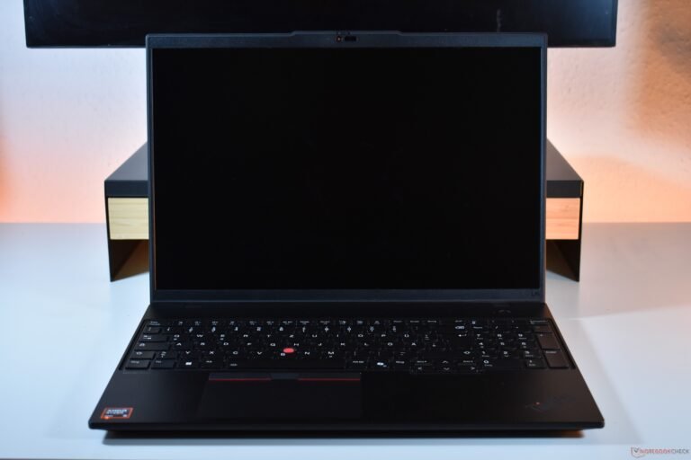 Lenovo ThinkPad L16 G2 AMD laptop on a desk with a keyboard and mouse, showcasing its powerful AMD processor and comfortable design, perfect for productivity and data analysis
