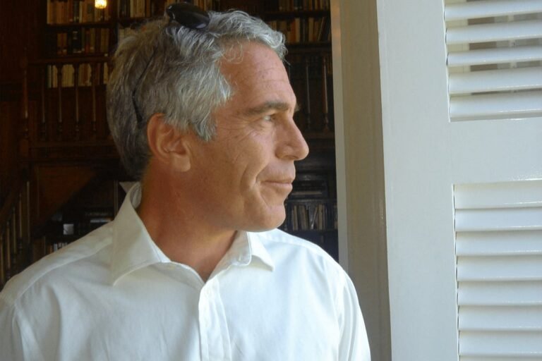 A photo of a storage locker with a sign that reads 'Epstein' and a red flag indicating the presence of disturbing content, highlighting the primary keyword of human trafficking
