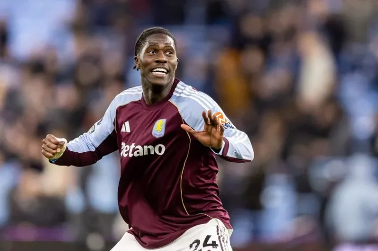 Aston Villa players in action with injured Onana