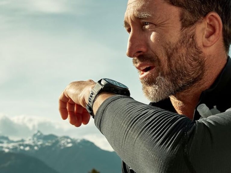 A person wearing a Garmin Fenix 8 Pro smartwatch, with a cityscape in the background, highlighting the importance of reliable cellular connectivity in the UK