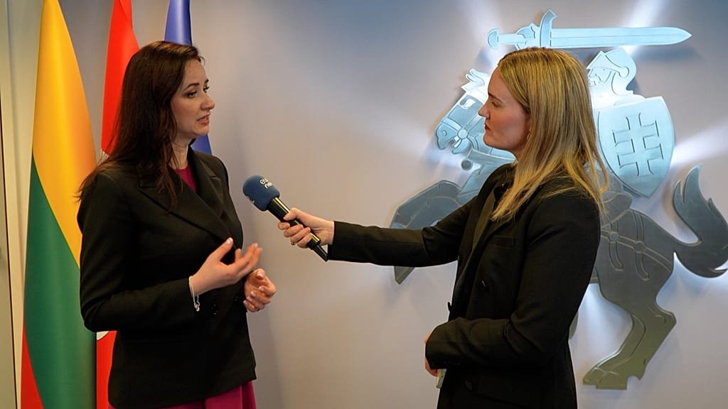 Aerial view of a pipeline stretching across the Ukrainian countryside, with a faint image of the Hungarian flag in the background, symbolizing the Hungary-Ukraine pipeline claims and controversy surrounding the energy landscape