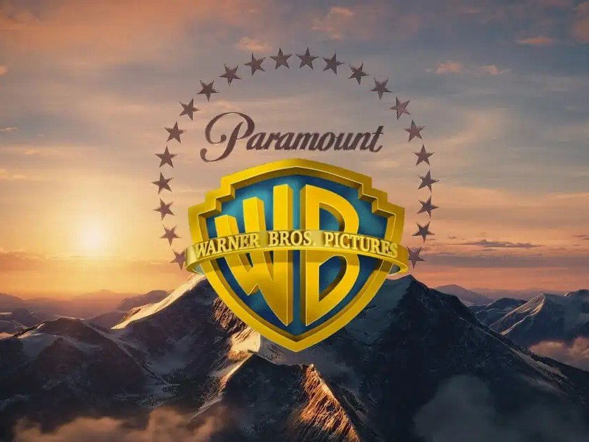 Paramount and Warner Bros logos with a cityscape of London in the background, symbolising the acquisition in the UK entertainment industry