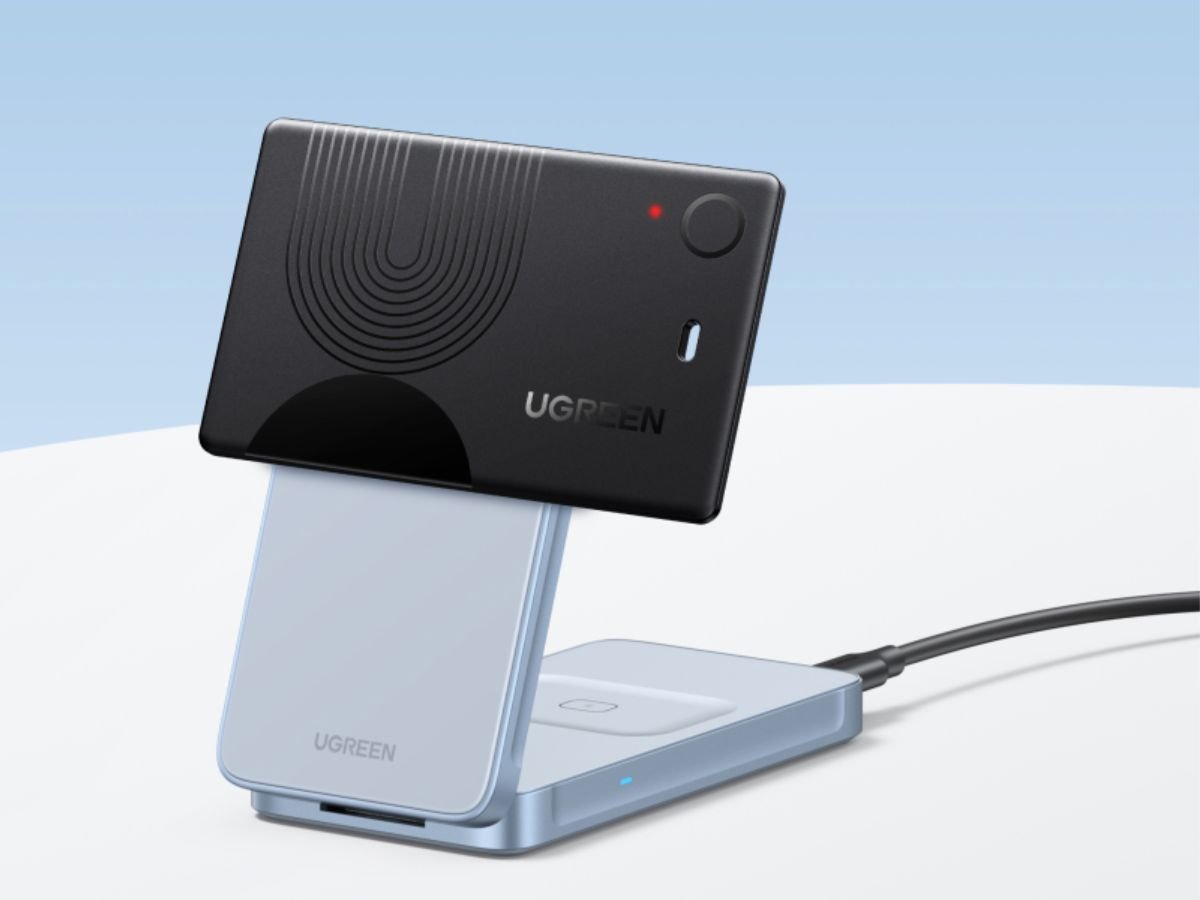 The Ugreen FineTrack Slim AirTag alternative device with wireless recharging, featuring a sleek and compact design, perfect for tracking valuable items in the UK, with a one-year battery life estimate and IP68 dust and water resistance.