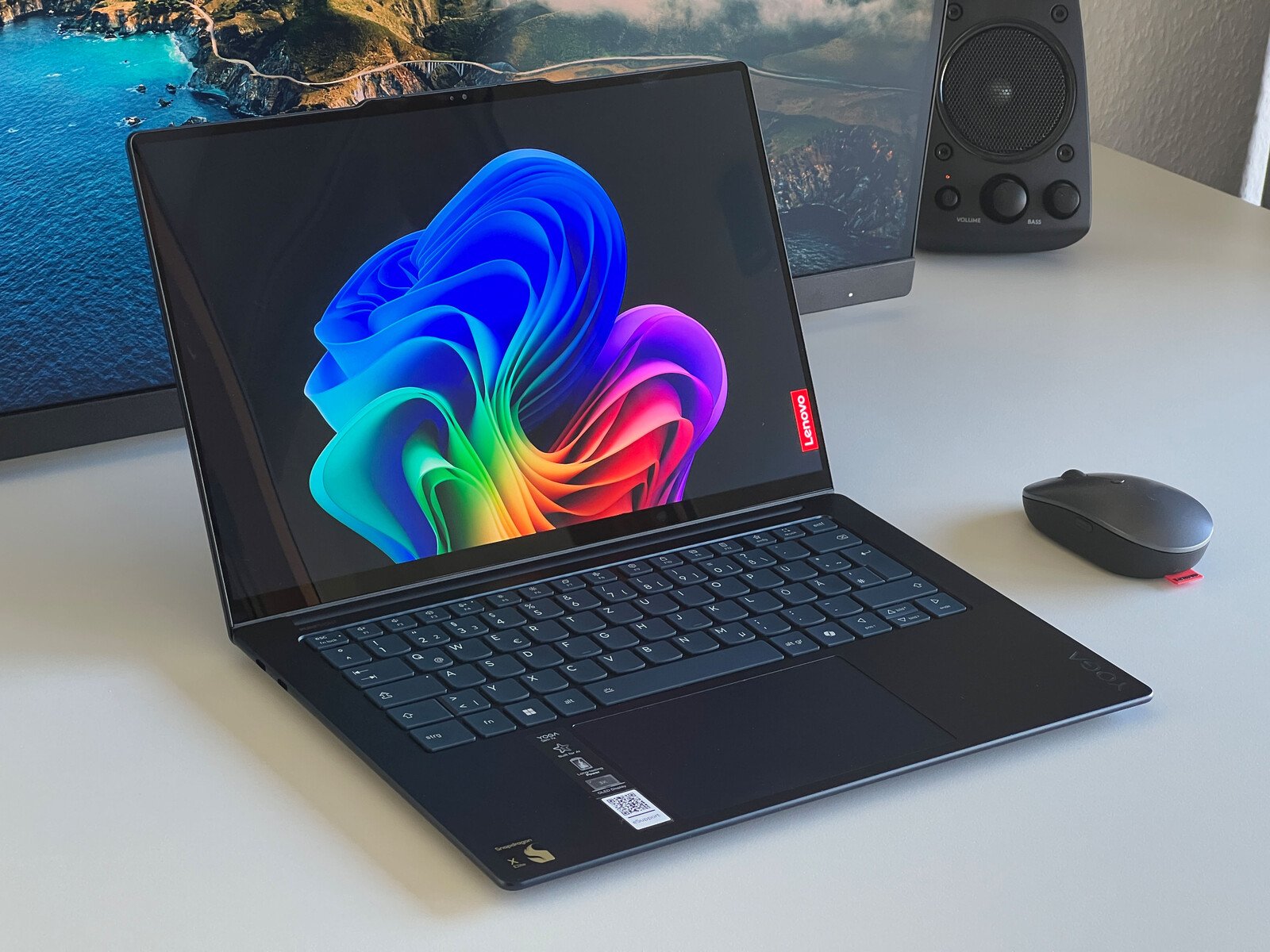 The Lenovo Yoga Slim 7x 14 features a stunning 90 Hz 3K OLED touch display, Qualcomm's Snapdragon X Elite SoC, and a sleek design, making it a top choice for those seeking a high-performance laptop with a vibrant colour display and exclusive UK deals