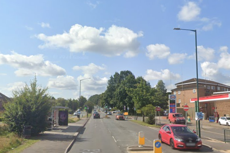 A boy riding an e-bike near an ice rink, with a blurred background to represent a violent e-bike robbery in Solihull, highlighting the need for safety and security measures to prevent such incidents