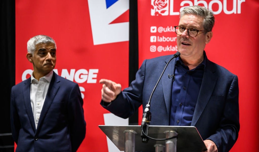 Keir Starmer and Sadiq Khan, UK politicians, in a heated discussion about the Labour Party's by-election defeat, with a focus on the party's behaviour and strategy in the run-up to the election, and the need for a more effective and inclusive political system