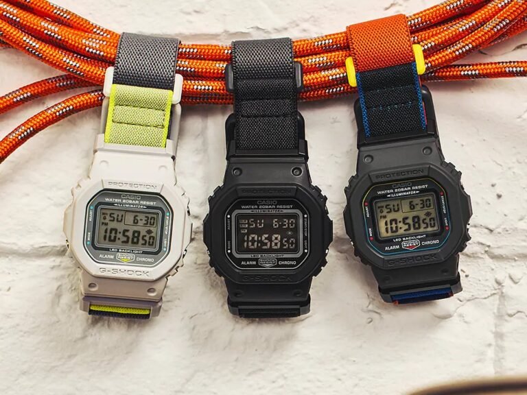 Casio's new DW-5600 watches with magnetic FIDLOCK buckle and cloth strap, perfect for everyday wear in the UK, featuring a classic square G-Shock design with enhanced comfort and style