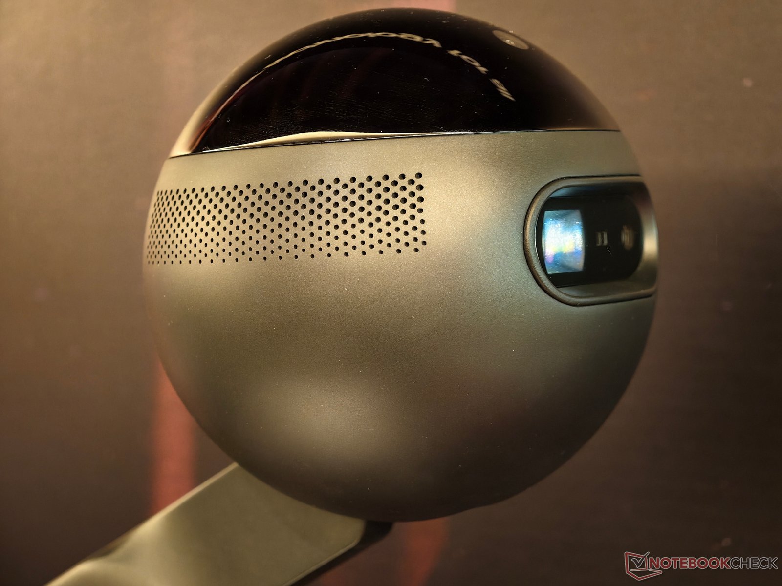 Lenovo's AI Workmate Concept, a sleek and innovative desktop projector with AI-powered features, showcased at the Mobile World Congress 2026 in the UK, featuring a high-brightness projector and built-in AI assistant, perfect for modern workspaces and collaborative environments