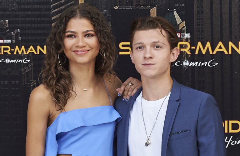 Zendaya and Tom Holland walking hand in hand, with a beautiful colour-coordinated outfit, sparking rumours of their secret wedding, with a focus on their behaviour and relationship