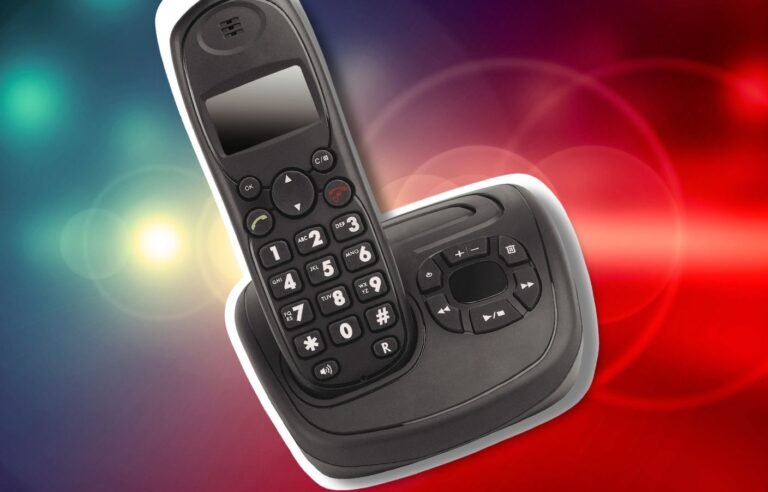 A cordless phone being used in a disaster relief scenario, with emergency responders coordinating their efforts in the background, highlighting the importance of reliable communication in these situations, with the UK's unique landscape and climate posing significant challenges for disaster relief efforts