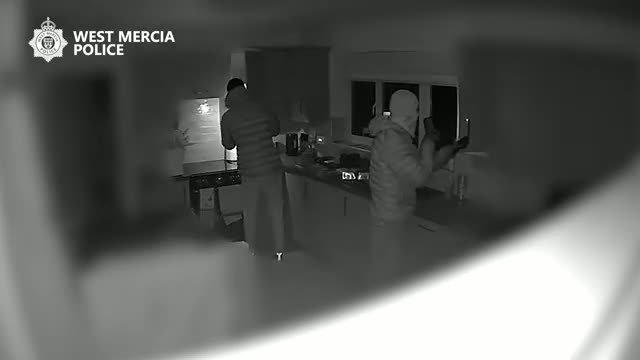 A Mercedes car parked on a driveway with a steering wheel lock and car alarm system, highlighting the importance of vehicle security and preventing car key burglary with effective security measures