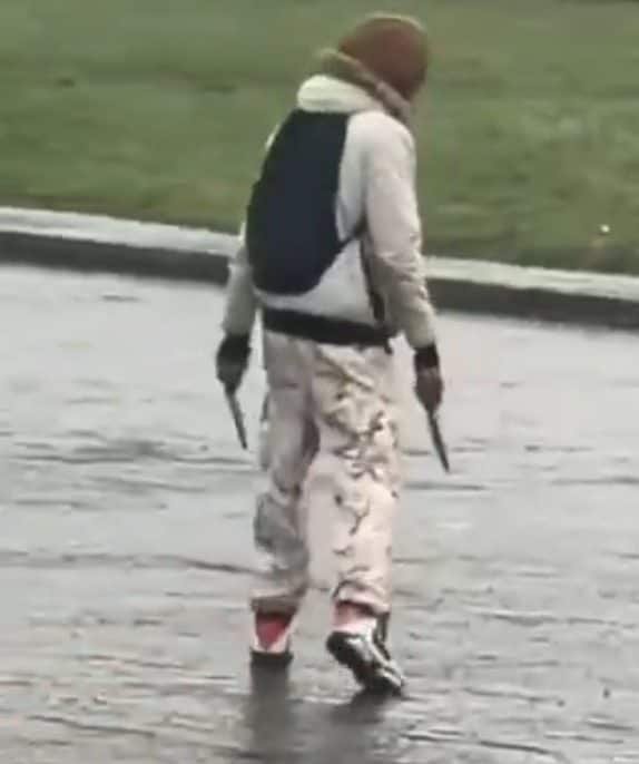 A descriptive image of the Edinburgh stabbing incident, featuring a dark figure and a concerned community, with a focus on the primary keyword of Edinburgh stabbing