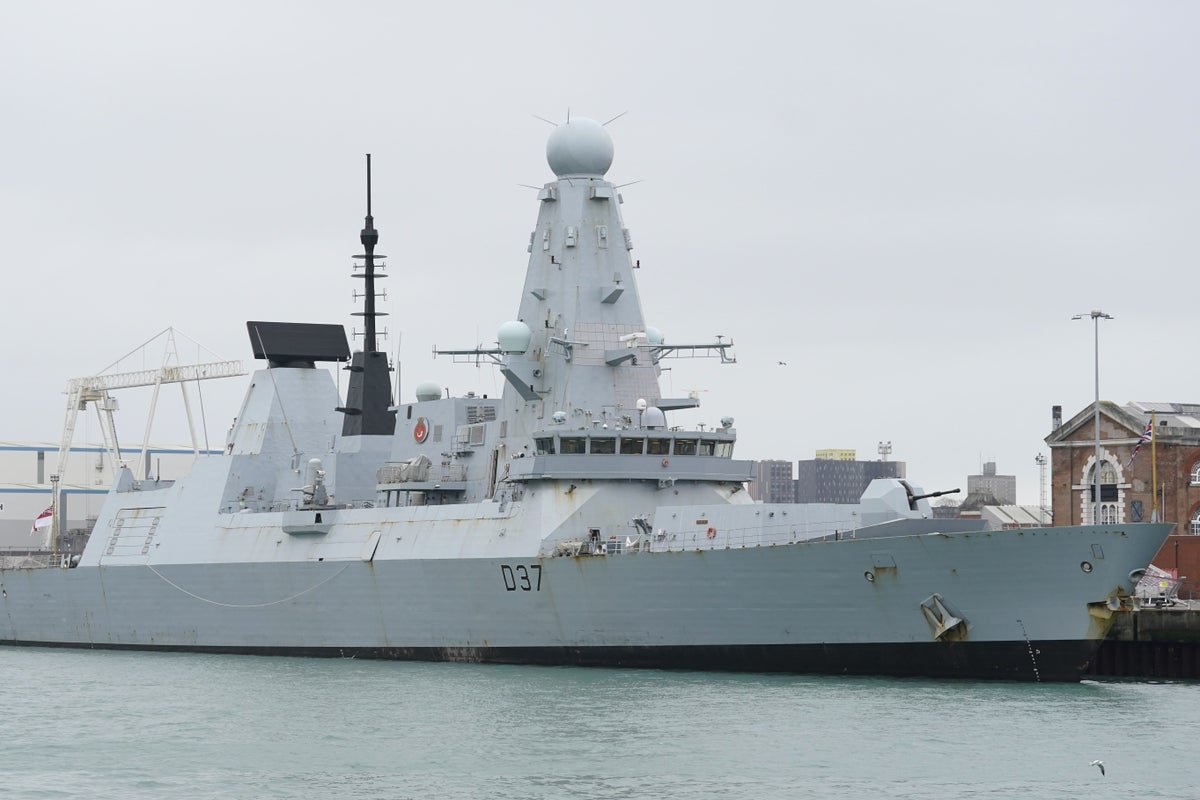 The HMS Duncan warship, a Type 45 destroyer, sails through the Middle East waters, with its advanced radar system and weaponry on display, as the UK considers deploying it to the region amid rising tensions with Iran, with the Cyprus RAF base strike highlighting the need for increased security measures
