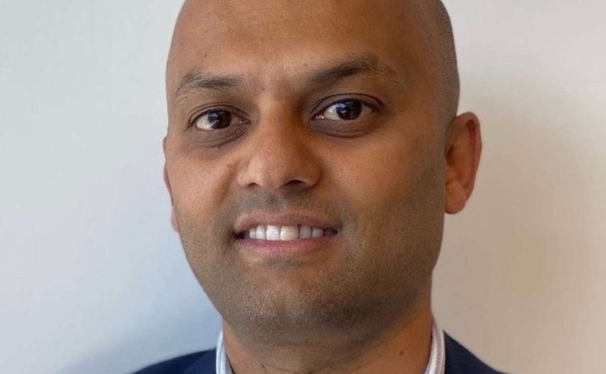 A senior police official in a suit, with a caption reading 'Police Federation boss arrested over fraud allegations, sparking a thorough investigation'