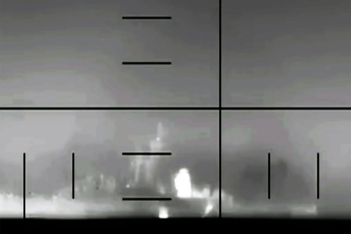 A US submarine operating in international waters, with the Iranian warship in the background, highlighting the tense maritime security situation in the region