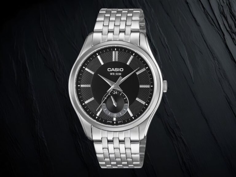 The Casio MTP-B315 watch features a slim stainless steel casing and a 24-hour sub-dial, available in various dial colours and strap options, perfect for watch enthusiasts in the UK seeking a stylish and functional timepiece.