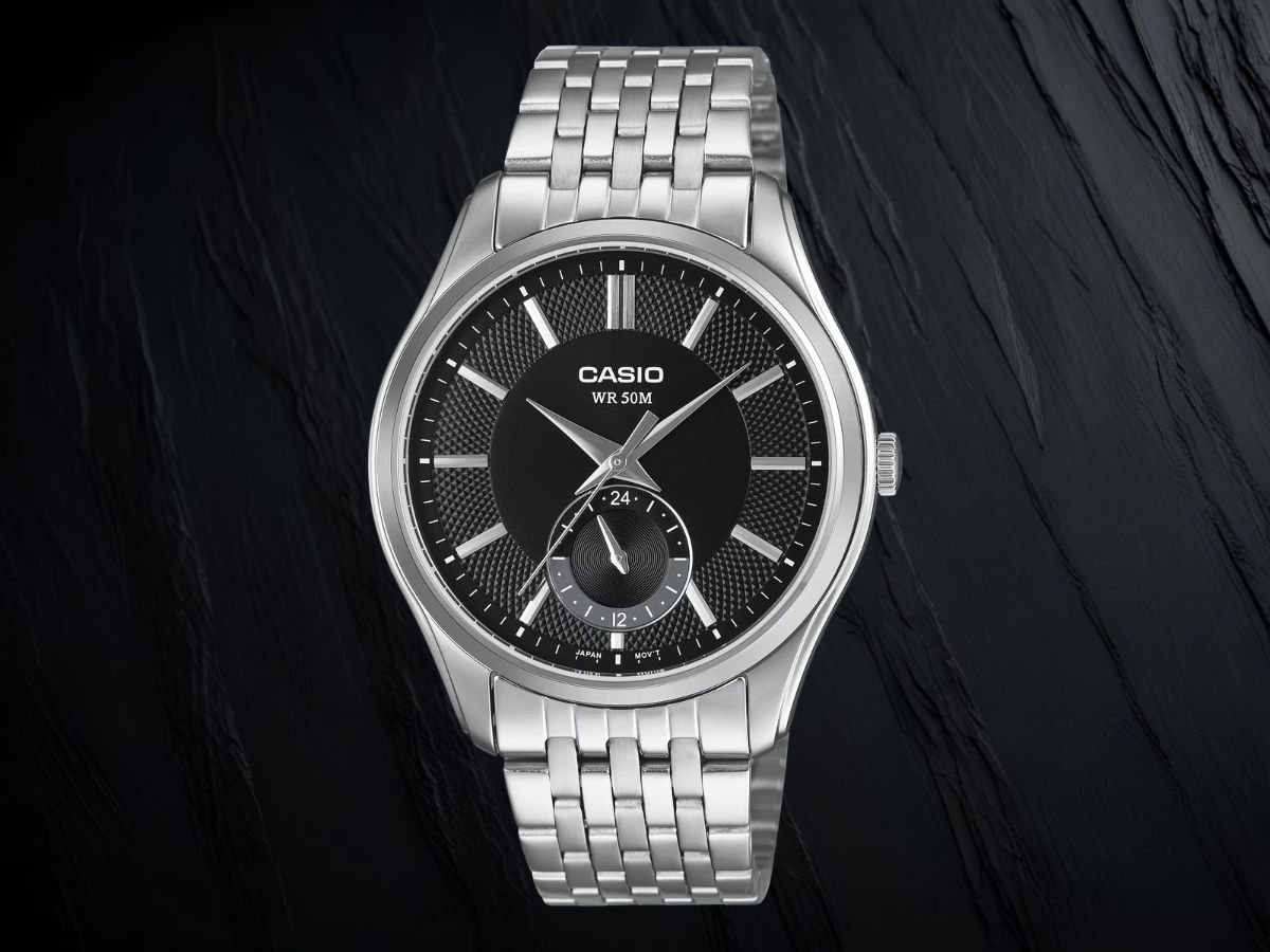 The Casio MTP-B315 watch features a slim stainless steel casing and a 24-hour sub-dial, available in various dial colours and strap options, perfect for watch enthusiasts in the UK seeking a stylish and functional timepiece.