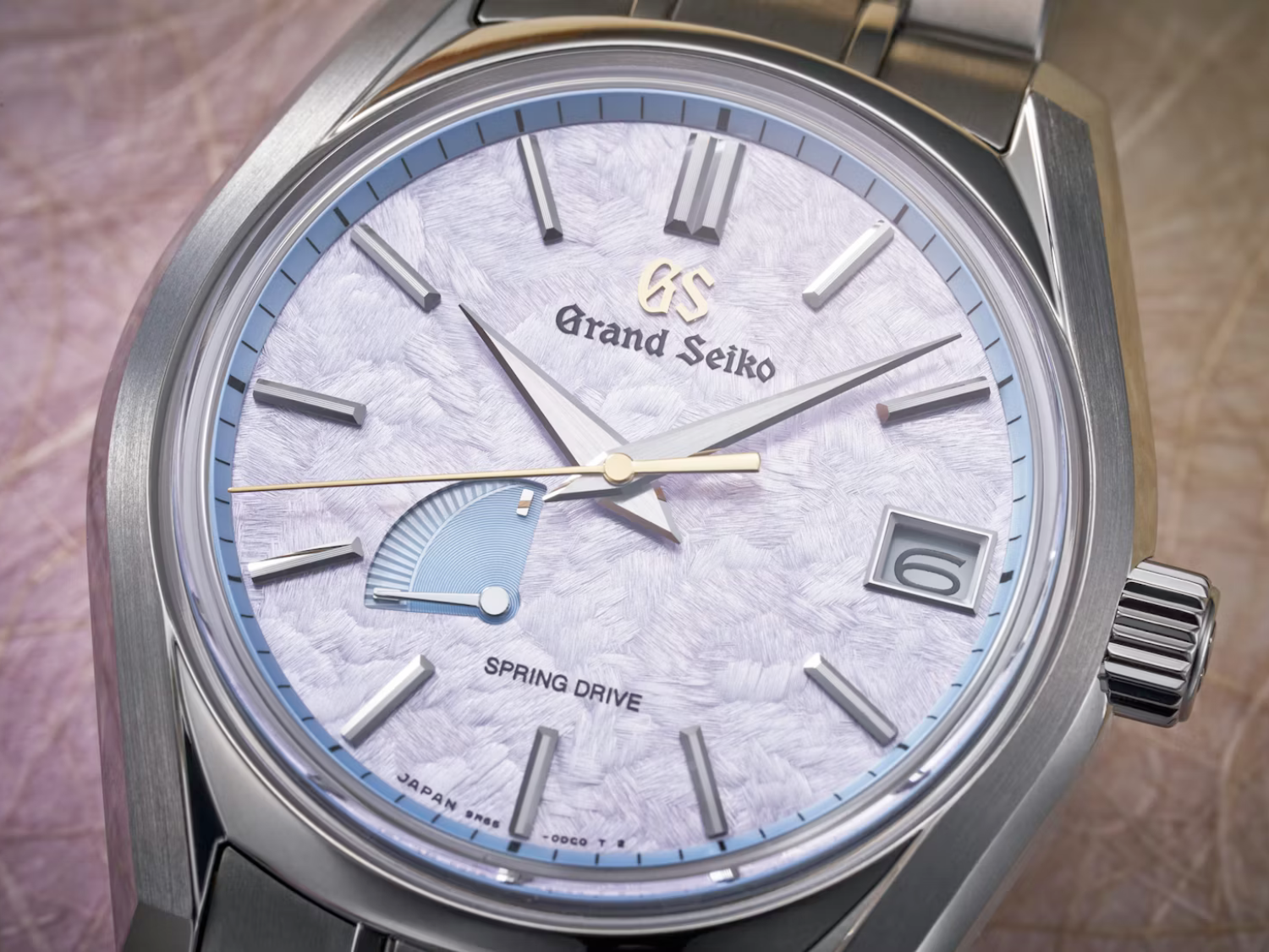 The Grand Seiko SBGA521 features a stunning violet 'Hana-ikada' dial and high-intensity titanium construction, making it a unique and exclusive timepiece in the UK watch market, with a limited edition of 45 pieces and a Spring Drive 9R65 caliber, this watch is sure to impress with its exceptional accuracy and reliability, perfect for collectors and watch enthusiasts in the UK