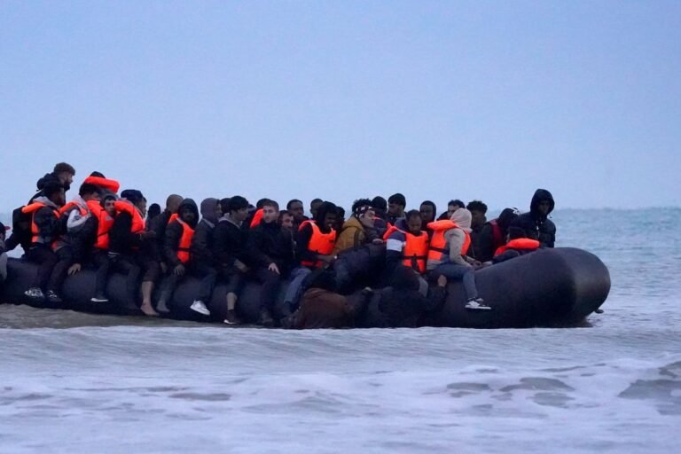 A family with young children sitting on a couch, looking at a map of the world, considering their options for relocation with a substantial payment of £40,000 to leave the UK, as part of the government's new scheme to support failed asylum seeker families