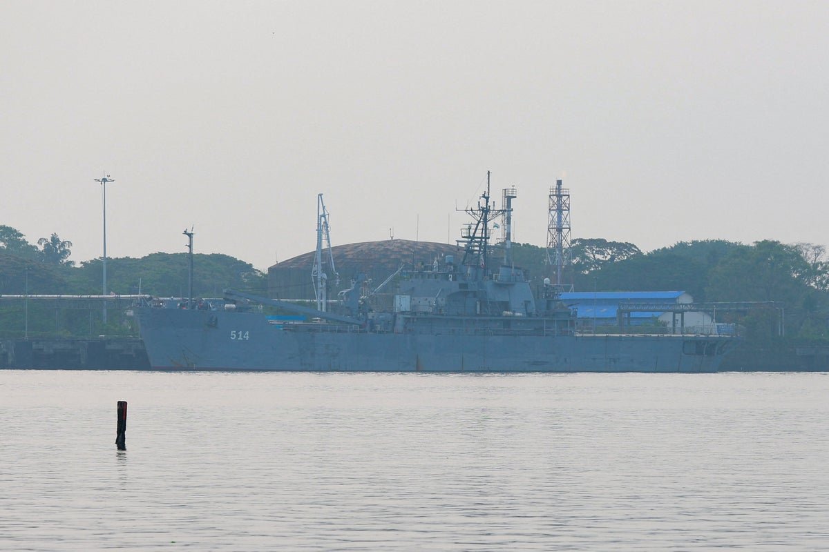 An Iranian warship docked in an Indian port, symbolising the country's commitment to regional cooperation and international law, amidst the complex geopolitical landscape of the Middle East and South Asia, with the warship's presence sparking a flurry of diplomatic activity