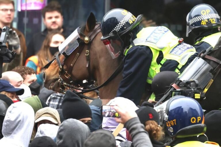 A descriptive image of protesters and police in Bristol, with a focus on the anti-racism protests and the need for peaceful coexistence, as people from all walks of life gather to express their views and promote unity