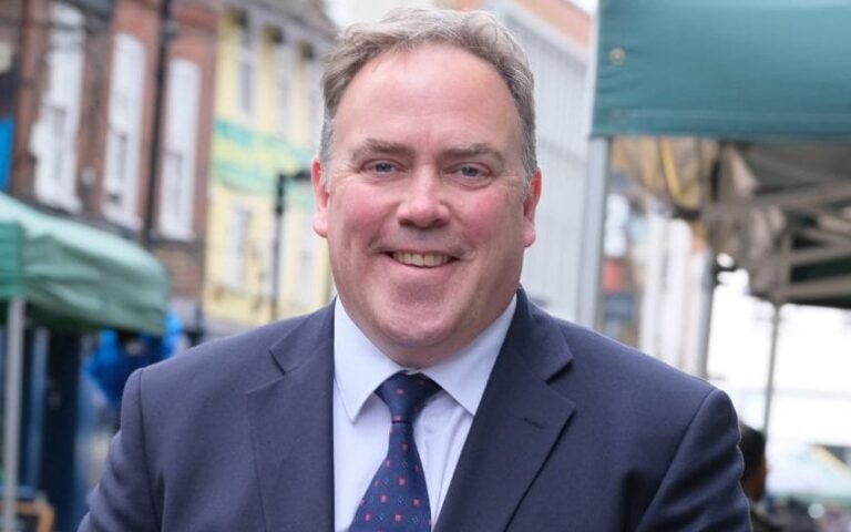 A photo of a road closure sign in a residential area, highlighting the impact of Low Traffic Neighbourhoods on local communities and the environment, with a focus on the primary keyword phrase 'Low Traffic Neighbourhoods'