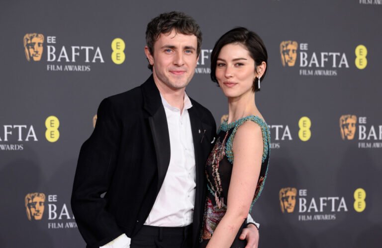 Gracie Abrams and Paul Mescal walking hand in hand in London, with a colourful background of the city's streets and landmarks, as the singer-songwriter starts her new life in the vibrant city, with her music and love at the forefront