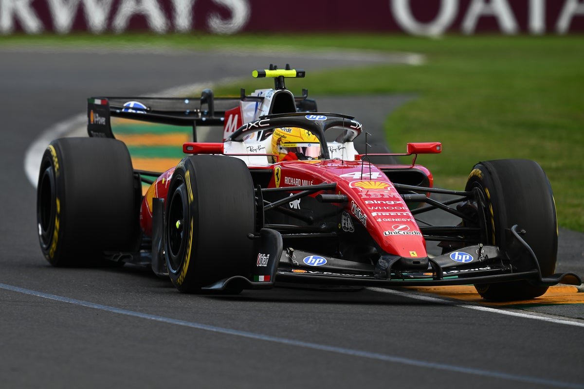 George Russell celebrating his Australian GP victory with his team, a thrilling win that has sparked debate and discussion in the racing community, with Lewis Hamilton left furious at Ferrari's behaviour