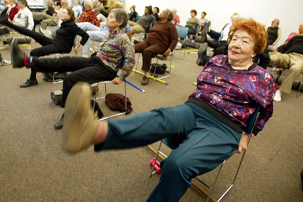 A retiree reviewing their will with a financial advisor, ensuring their estate is distributed according to their wishes and taking advantage of pension freedoms