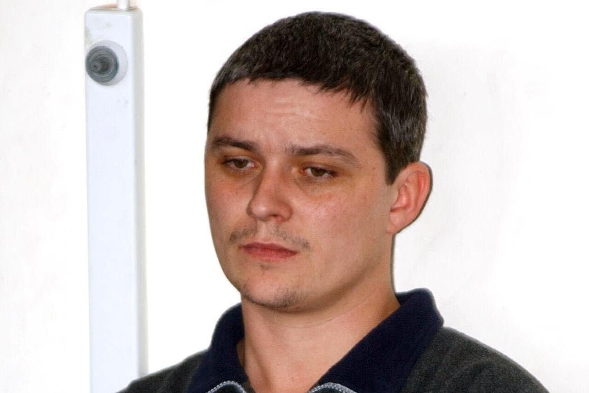A photograph of Ian Huntley, the Soham murderer, with a sombre expression, highlighting the true crime and prison sentence, with a focus on the primary keyword, Ian Huntley