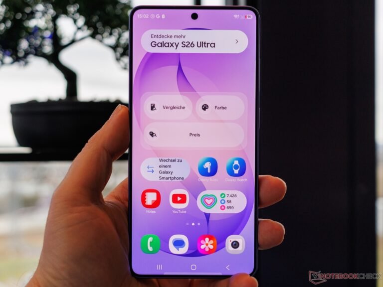 The Samsung Galaxy S26 Ultra smartphone with a cluttered homescreen, featuring various pre-installed apps and widgets, highlighting the bloatware issue in the UK, with a mix of colour and design elements that showcase the device's features and behaviour.